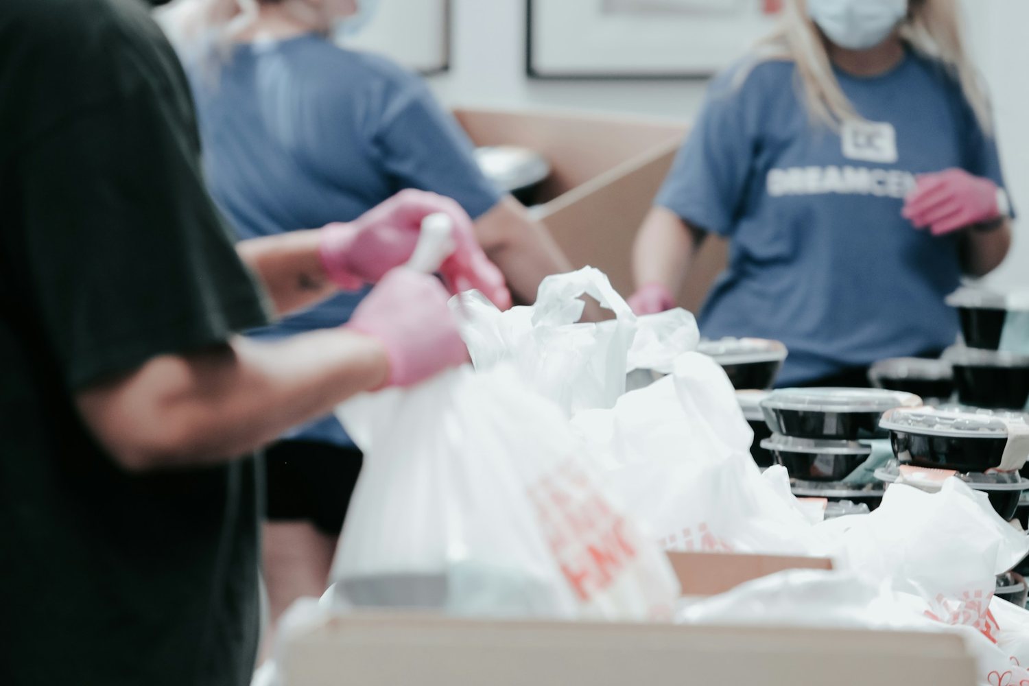 Volunteers preparing donation packages